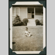 Boy sits in on the lawn (ddr-densho-359-1036)
