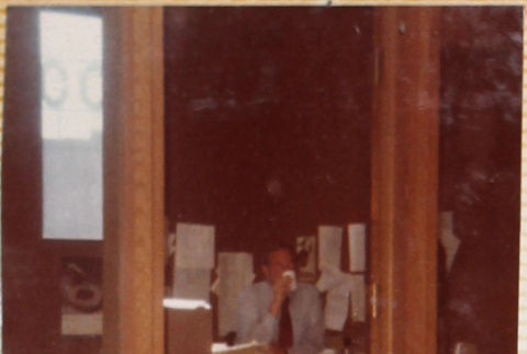 Man sitting in office (ddr-densho-426-1249)