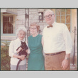Man and two women, one holding car (ddr-densho-523-651)