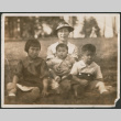 Photo of a woman with three children (ddr-densho-483-929)