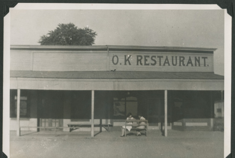 2 women outside OK Restaurant (ddr-densho-378-413)