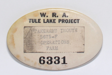 W.R.A. Tule Lake Project nametag (ddr-densho-365-18)