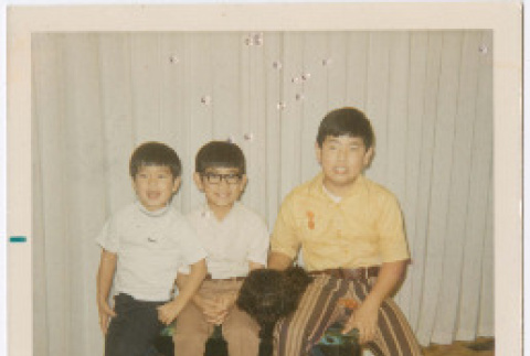 Christmas photo card with three boys (ddr-densho-430-296)