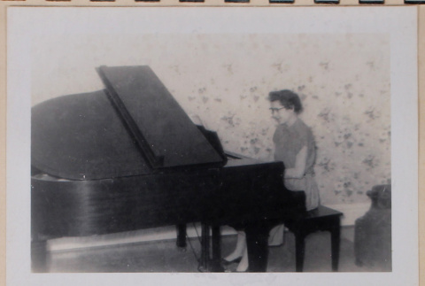 Betty playing piano (ddr-densho-462-270)