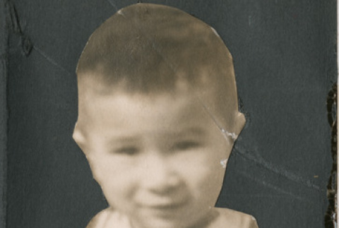 Cutout photo of child holding a purse (ddr-densho-483-535)