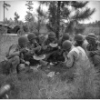 Soldiers eating watermelon (ddr-densho-1007-435)