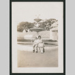 two people sitting on a fountain (ddr-densho-378-766)