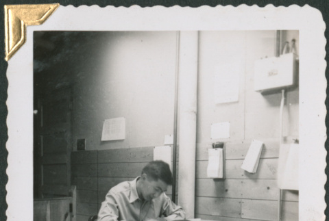 Man working at desk (ddr-densho-434-194)