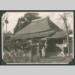 Photo of two women outside a Japanese house (ddr-densho-483-356)