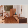 Room with wood floor and cabinets with arrangements (ddr-densho-534-73)