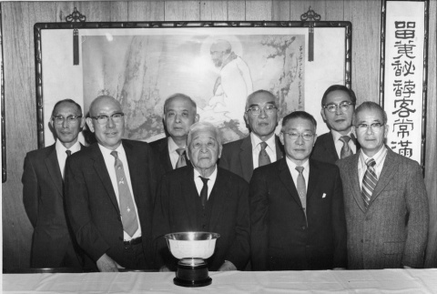 Fujitaro Kubota at a ceremony with a group of unidentified men. (ddr-densho-354-77)