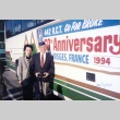 Nisei couple in front of tour bus (ddr-densho-105-16)