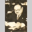 Man reading a book (ddr-njpa-4-2400)