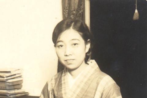 Woman seated at a desk (ddr-njpa-4-2301)