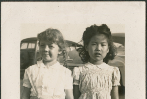 Two girls holding hands (ddr-densho-316-417)