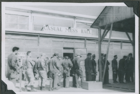 Soldiers lined up in front of a mess hall (ddr-densho-201-792)
