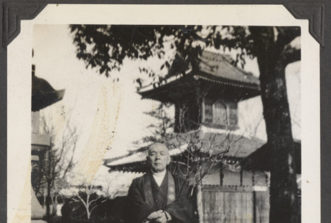 A man at a Japanese temple (ddr-densho-432-76)