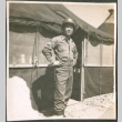 Soldier in front of tents (ddr-densho-201-513)