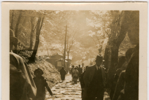 People walking on stone walkway (ddr-densho-426-1392)
