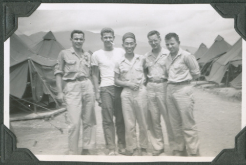 Five men standing by tents.  Joe Iwataki in center (ddr-ajah-2-626)
