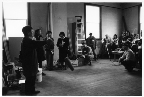 Woman speaking in front of film crew at Japanese Language School reunion (ddr-densho-506-101)