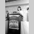 Woman at podium (ddr-densho-1007-509)