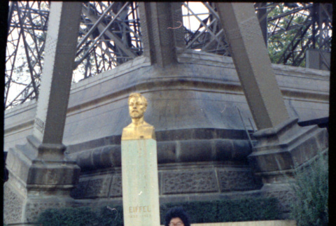 Martha (Nozawa) Tsuchida at base of Eiffel Tower (ddr-densho-426-703)