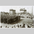 Soldiers gathered in yard (ddr-densho-1007-597)