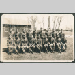 Portrait of group of men in uniform outside barracks (ddr-ajah-2-743)