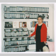 Mitzi Isoshima with videotape collection (ddr-densho-477-751)