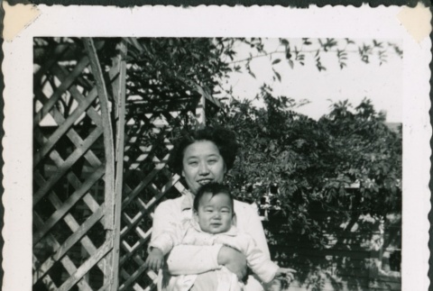 Woman holding a baby (ddr-densho-321-272)