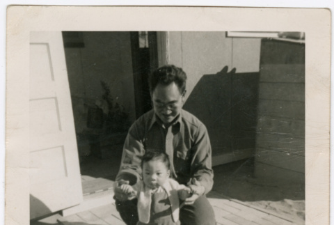 Kaneji Domoto with baby (ddr-densho-329-1318)