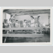 Children carrying stacks of books (ddr-densho-37-2131)