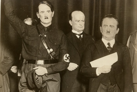 Wax figures of Adolf Hitler, Benito Mussolini, and Engelbert Dolfuss (ddr-njpa-1-658)