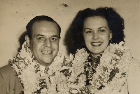 A couple wearing leis (ddr-njpa-1-484)