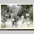 Okinawans walking on a road (ddr-densho-179-27)