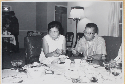 Couple at dinner party (ddr-densho-522-130)