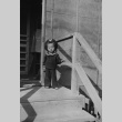 Child on barracks steps (ddr-densho-156-22)