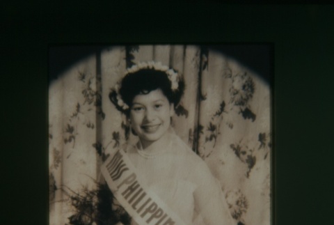 (Slide) - Image of woman in dress with flowers and sash (ddr-densho-330-202-master-d78ce9788d)
