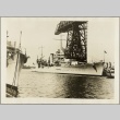 The USS Astoria at a dock (ddr-njpa-13-349)