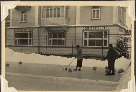 People curling (the sport) outside cafe (ddr-densho-466-813)