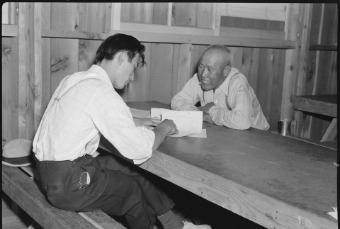 Japanese American being interviewed (ddr-densho-151-429)