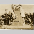 A young girl unveiling a monument to Amelia Earhart at Diamond Head (ddr-njpa-1-1354)