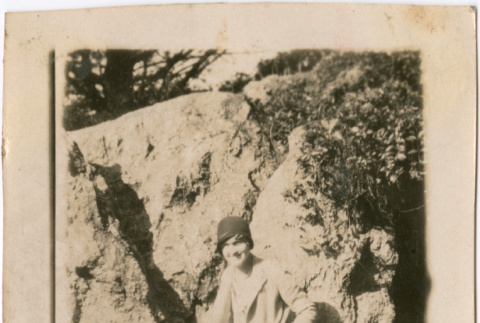 Woman seated on rocks (ddr-densho-423-559)