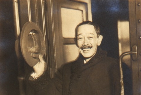 Otohiko Matsukata waving at Tokyo Station (ddr-njpa-4-831)