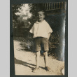 boy outside house (ddr-densho-378-704)