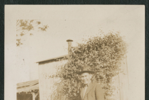 Man in front of shed (ddr-densho-378-275)