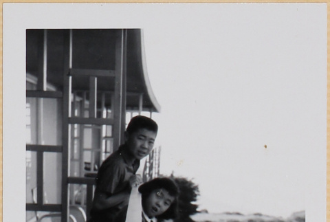 William, Susan, Leslie Shiomi by railing (ddr-densho-522-582)
