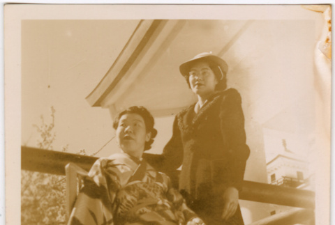 Two women, Tomoye (Nozawa) Takahashi standing on right (ddr-densho-426-1510)