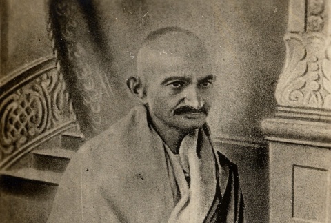 Gandhi seated wearing a prayer shawl (ddr-njpa-1-449)